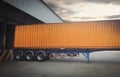 Trailer Truck Parked Loading at Dock Warehouse. Cargo Shipment. Industry Freight Truck Transportation. Shipping Warehouse Logistic Royalty Free Stock Photo