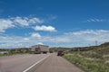 A trailer truck transporting a mobile home on the road near the city of Gallup, New Mexico