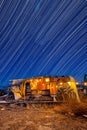 Trailer Under Convergence Star Trails in Bombay Beach