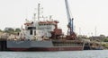 Trailing suction hopper dredger alongside dock. Falmouth, UK. Royalty Free Stock Photo