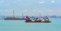 Dredger vessels anchored in Johor strait. Royalty Free Stock Photo