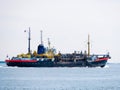 Trailing suction hopper dredger ship unloading at North Sea near