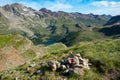 Trailmarks and a cairn in the mountains in Grisons, Switzerland