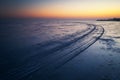 Trails on the surface of frozen lake. Winter Landscape Royalty Free Stock Photo