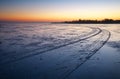 Trails on the surface of frozen lake. Royalty Free Stock Photo