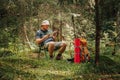 Trailside Tranquility Young Hiker Immersed in a Captivating Book