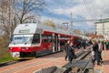 The train arrived on railway station in spring time