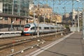 The train arrives at the railway station Royalty Free Stock Photo