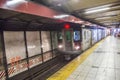 Train arrives in the underground station in New York Royalty Free Stock Photo