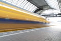 Train arriving in Amsterdam Central station Royalty Free Stock Photo
