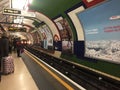 Train arriving at a platform in London subway Royalty Free Stock Photo