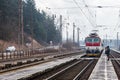 Train is arriving into the railway station of Ruzomberok, Slovak Royalty Free Stock Photo