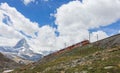 train on the background of the Matterhorn mountain in the Swiss Alps Royalty Free Stock Photo