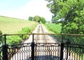 Antique Train observation car view of traintrack in Pennsylvania countryside Royalty Free Stock Photo
