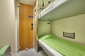 Train berth indoor with two beds. Travel background.