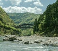 Train bridge between the hills along Hozugawa River.