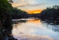 Train bridge over the Suwanee River at sunset.