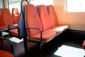Train cabin with orange seats