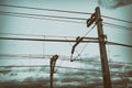 Train cable catenary and poles with vintage filter