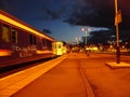 Train Caledonian Sleeper stands by the platform before departure.