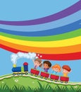 Train with children infront of rainbow