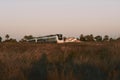Train circulating during sunset in the province of Alicante in Spain