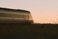 Train circulating during sunset in the province of Alicante in Spain