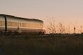 Train circulating during sunset in the province of Alicante in Spain