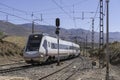 Train circulating on a track in southern Spain