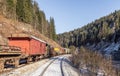 Train. Rusty. Snow. Winter. Forest. Mountains Royalty Free Stock Photo