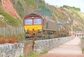 Train by the coast at Teignmouth, Devon Royalty Free Stock Photo