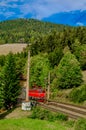 a train is coming into the breitenstein am semmering train station which is part of the famous semmeringbahn in austria