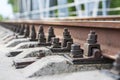 Train comming. Railway track. Railway sleepers and rails close-up. Iron bolts and connections. Railway background. Railway