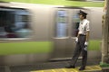 Train controller in train station in Tokyo