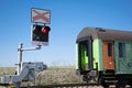 Train crossed controlled railroad crossing.  Railroad crossing sign lights Royalty Free Stock Photo