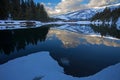 A train crosses a river in Montana