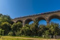 A train crosses a section of the Chappel Viaduct near Colchester, UK