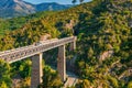 Train crossing Eiffel Viaduct in Vecchio Corsica