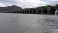 Train crossing river on Stone Bridge