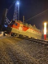 The train derailed at night. Train lighting