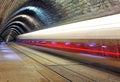 Train disappearing into a tunnel