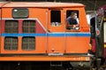 Train driver in his locomotive a Bangkok main station