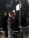 Train Driver on Steam Train at Oxenhope Railway Station on Keighley and Worth Valley Railway. Yorkshire, England, UK,