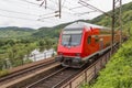 Train driving along german river Moselle Royalty Free Stock Photo