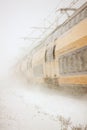 Train driving in severe snowstorm Royalty Free Stock Photo