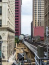 Train on elevated tracks within buildings at the Loop, Chicago City Center - Chicago, Illinois Royalty Free Stock Photo