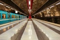 A train entering a subway station platform Royalty Free Stock Photo
