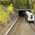 Train Entering Tunnel in Stockholm, Sweden Royalty Free Stock Photo