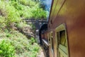 Train enters a tunnel near Idalgashinna, Sri Lan