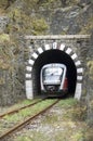 Train exit from railway stone tunnel